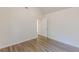 Bright bedroom with wood floors and vaulted ceiling at 239 Gilliam Ct, Locust Grove, GA 30248