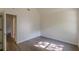 This bedroom is well lit, with durable floors and a view to the hallway at 239 Gilliam Ct, Locust Grove, GA 30248
