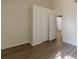 Bright bedroom boasts a walk-in closet and durable laminate flooring at 239 Gilliam Ct, Locust Grove, GA 30248