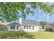 Well maintained home boasts many windows and a spacious backyard at 239 Gilliam Ct, Locust Grove, GA 30248