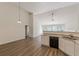 Open concept kitchen with granite countertops, and dining area, with lots of light at 239 Gilliam Ct, Locust Grove, GA 30248