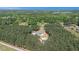 Aerial view of a home surrounded by dense trees, offering a secluded and tranquil environment at 2925 Old Broadnax Mill Rd, Loganville, GA 30052
