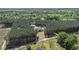Aerial view of a home nestled among lush trees, providing privacy and a serene setting at 2925 Old Broadnax Mill Rd, Loganville, GA 30052