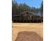 Spacious barn with a sturdy structure, ideal for livestock or storage at 2925 Old Broadnax Mill Rd, Loganville, GA 30052
