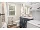 Bathroom featuring washer and dryer, a bathtub and modern finishes at 2925 Old Broadnax Mill Rd, Loganville, GA 30052