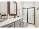 Contemporary bathroom features a glass shower, ample vanity space, and stylish decor at 2925 Old Broadnax Mill Rd, Loganville, GA 30052