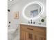 Stylish bathroom featuring a modern vanity and illuminated mirror at 439 Wind Walk Cir, Lawrenceville, GA 30044