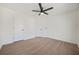 Spacious bedroom with wood-look floors and two closets at 439 Wind Walk Cir, Lawrenceville, GA 30044