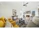 Open living room with fireplace, stylish seating, area rug, and plenty of sunlight at 439 Wind Walk Cir, Lawrenceville, GA 30044