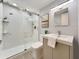 Bright bathroom with modern fixtures, stylish vanity, and glass-enclosed shower at 1135 Clairemont Ave # B, Decatur, GA 30030
