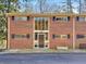 Charming brick facade with a striking central window feature and clean, modern lines at 1135 Clairemont Ave # B, Decatur, GA 30030
