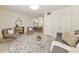 Inviting living room featuring a modern chair, comfortable gray sofa and an open floorplan at 1135 Clairemont Ave # B, Decatur, GA 30030