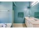 En-suite bathroom with dual sinks, granite countertops, and a bathtub, offering a luxurious retreat at 4150 Soaring Dr, Douglasville, GA 30135