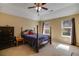 Bedroom with vaulted ceilings, a ceiling fan, and natural light at 4150 Soaring Dr, Douglasville, GA 30135