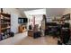 Bonus room featuring neutral carpet, a ceiling fan, and versatile space for a home office at 4150 Soaring Dr, Douglasville, GA 30135