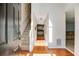 Inviting entryway with hardwood floors and view of staircase and living spaces at 4150 Soaring Dr, Douglasville, GA 30135