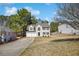 Charming two-story home featuring a two car garage and traditional architectural details at 4150 Soaring Dr, Douglasville, GA 30135
