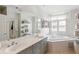 Spacious bathroom with double sinks, a bathtub, and plenty of light at 50 Biscayne Nw Dr # 6117, Atlanta, GA 30309