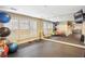 Fitness center equipped with exercise balls, kettlebells, and weightlifting equipment at 50 Biscayne Nw Dr # 6117, Atlanta, GA 30309
