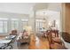 Bright living room with dining area, shutters, and comfortable seating at 50 Biscayne Nw Dr # 6117, Atlanta, GA 30309