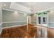 Well-lit bedroom featuring hardwood floors, recessed lights and backyard access at 750 Crest Valley Nw Dr, Sandy Springs, GA 30327