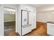 Kitchen with stainless steel refrigerator with hardwood flooring at 750 Crest Valley Nw Dr, Sandy Springs, GA 30327
