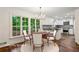 Dining area with view to the kitchen with stainless appliances at 750 Crest Valley Nw Dr, Sandy Springs, GA 30327