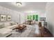 Open concept living room with view to kitchen at 750 Crest Valley Nw Dr, Sandy Springs, GA 30327