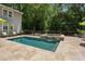 Backyard pool featuring a built-in hot tub and deck at 750 Crest Valley Nw Dr, Sandy Springs, GA 30327