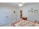 Cozy bedroom with ample closet space, neutral walls, and a ceiling fan at , Auburn, GA 30011