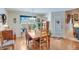 Cozy dining area with hardwood floors and a view of the outdoors, perfect for casual meals at , Auburn, GA 30011