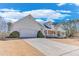 Charming home with a two-car garage, covered front porch and driveway at , Auburn, GA 30011
