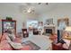 Bright living room with a stone fireplace and ample seating, flowing into the adjacent dining area for easy entertaining at , Auburn, GA 30011