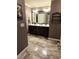 Bathroom featuring a vanity with double sinks, and decorative tile flooring at 1211 Chapel Estates Way, Dacula, GA 30019