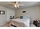Bright bedroom with double closets, carpet floors, and natural light from a window at 1211 Chapel Estates Way, Dacula, GA 30019