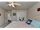 A bedroom with double door closet, and a stationary bike next to the bed at 1211 Chapel Estates Way, Dacula, GA 30019
