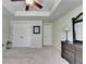 Carpeted bedroom with white walls and doors plus a dark wood dresser and large mirror at 1211 Chapel Estates Way, Dacula, GA 30019