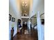Grand foyer with high ceilings, chandelier, and hardwood floors at 1211 Chapel Estates Way, Dacula, GA 30019