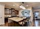 Open kitchen with a center island, stainless steel appliances, and access to dining room at 1211 Chapel Estates Way, Dacula, GA 30019