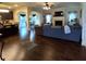 Open living area with a fireplace, sofa, and view of the dining area at 1211 Chapel Estates Way, Dacula, GA 30019