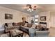 Spacious living room with hardwood floors, neutral walls, and stylish furniture at 1211 Chapel Estates Way, Dacula, GA 30019