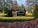 Inviting Chastain Park Condominiums sign surrounded by colorful shrubbery and landscaping at 3064 Chastain Park Ne Ct, Atlanta, GA 30342