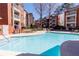 Beautiful swimming pool view with lounge chairs; perfect for relaxation in the sun at 3064 Chastain Park Ne Ct, Atlanta, GA 30342