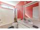 Bathroom featuring a toilet, sink, mirror, and a bathtub with a shower curtain at 320 Creekside Trl, Covington, GA 30016