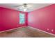 Bedroom featuring a window and carpet at 320 Creekside Trl, Covington, GA 30016