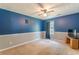 Bedroom featuring a ceiling fan, carpet, and a two-tone color scheme at 320 Creekside Trl, Covington, GA 30016