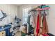 Walk-in closet featuring wire shelving, carpet floors, and natural light at 320 Creekside Trl, Covington, GA 30016