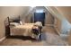 Cozy bedroom with carpeted floors and a large television set for entertainment at 275 Bridgemill Dr, Douglasville, GA 30134