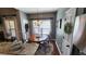 Inviting breakfast nook with a view of the backyard and a traditional wooden table at 275 Bridgemill Dr, Douglasville, GA 30134