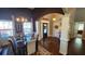 Elegant dining room boasts hardwood floors, chandelier, and views to the front entry of the home at 275 Bridgemill Dr, Douglasville, GA 30134